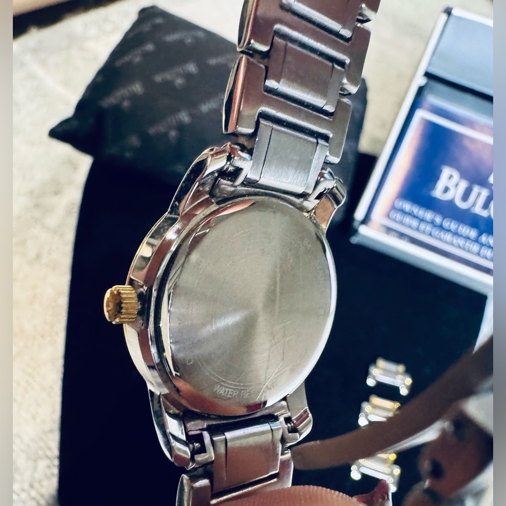 Bulova Two-Tone Stainless Mother of Pearl, Diamond Bezel Date Indicator Watch - Picture 8 of 15